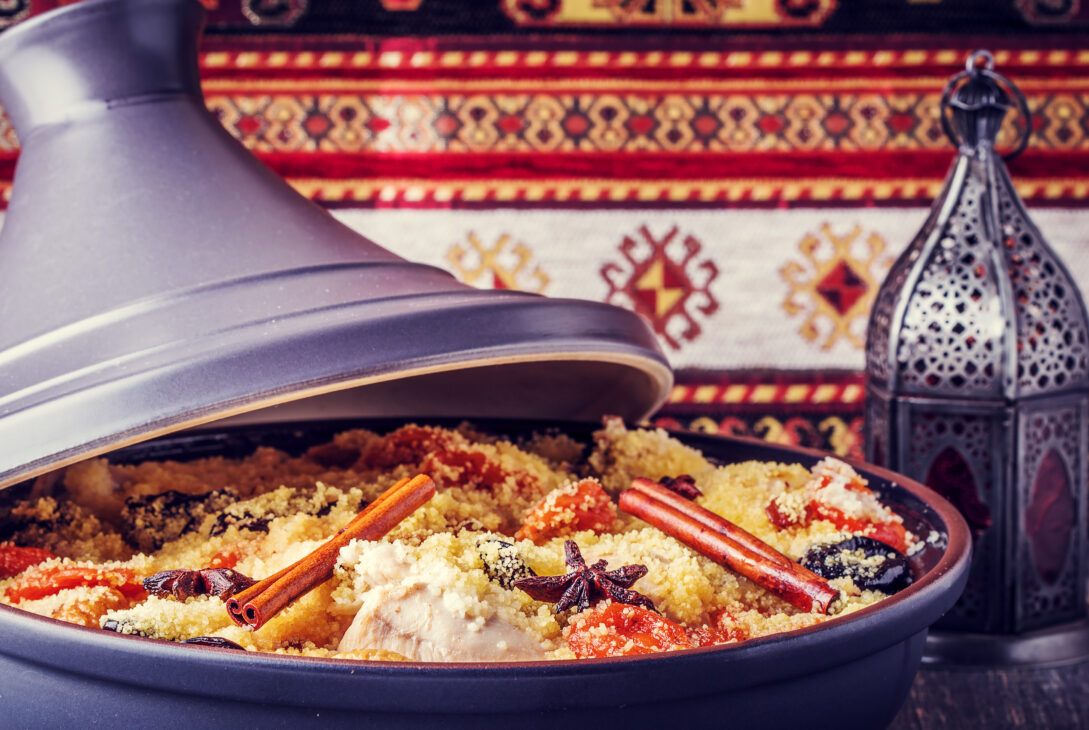 Traditional moroccan tajine of chicken with dried fruits and spices.