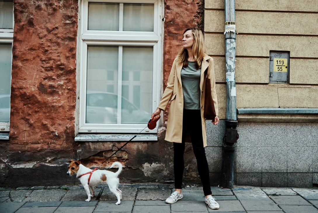 Woman walks with dog