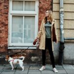 Woman walks with dog