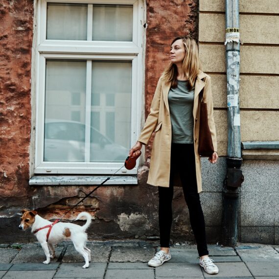 Woman walks with dog