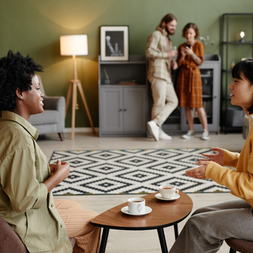 Women drinking coffee and talking